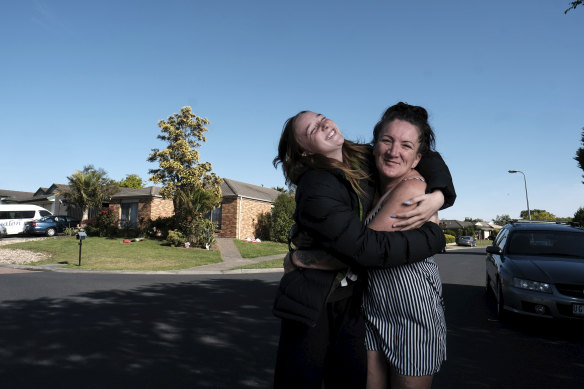 Tanya Holmes, right, and daughter Staci, 13.