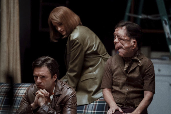 From left, Sebastian Stan, Renate Reinsve and Adam Pearson in a A Different Man.