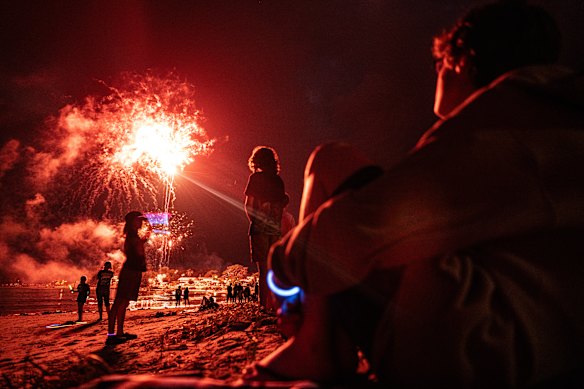Kids watch the NYE fireworks at Currarong in the NSW Shoalhaven