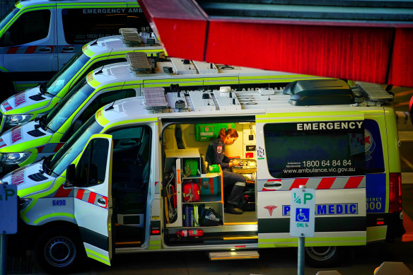 A paramedic at work inside an ambulance parked at Box Hill Hospital, one of the worst hospitals in the state for ambulance ramping.