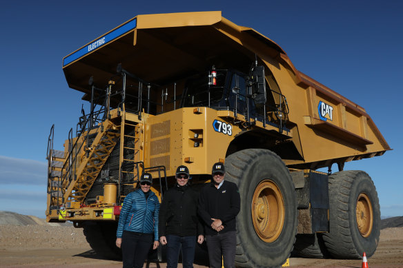 Caterpillar and BHP are developing electrical heavy-haul trucks to use in its mines. From left: BHP’s Anna Wiley, Mark Pickett and James Agar.