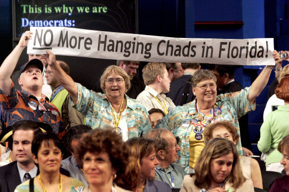 Democratic delegates from Florida express their displeasure with the election results in 2000, arrived at after multiple challenges and fastidious checking of paper ballots for "hanging chads".