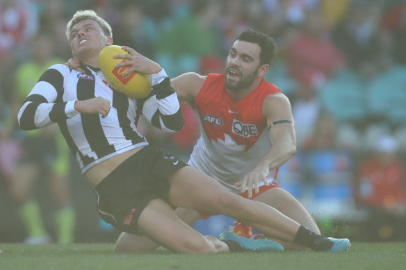 Jack Ginnivan is awarded a free kick for a high tackle which started Sunday’s booing.