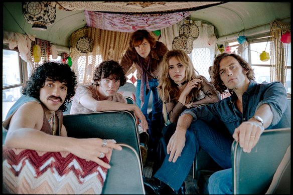 From left, Sebastian Chacon, Will Harrison, Josh Whitehouse, Suki Waterhouse and Sam Claflin in Daisy Jones & the Six.