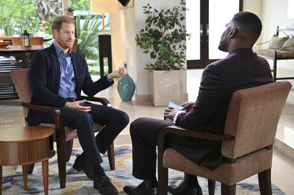 Prince Harry, left, during an interview with “Good Morning America” co-host Michael Strahan in Los Angeles.