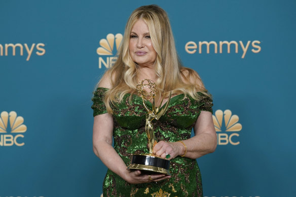 Coolidge poses with the award for supporting actress in a limited series or movie at the 2022 Primetime Emmy Awards.