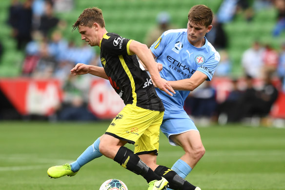 Melbourne City's Connor Metcalfe (right) is among Olyroos call-ups that have left Erick Mombaerts frustrated.