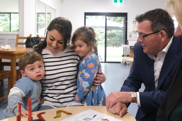 Premier Daniel Andrews with Natalie, and her children Rafael and Selina, in Narre Warren South on Sunday.
