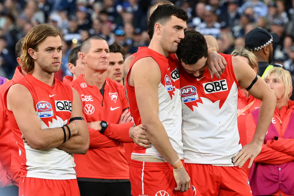 Tom and Paddy McCartin share an emotional moment after Sydney’s loss to Geelong in the 2022 AFL grand final.