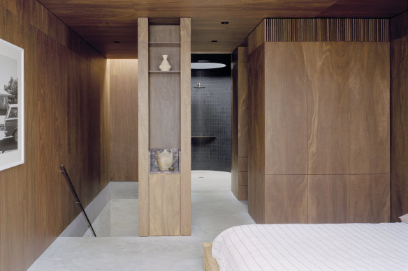 The bathroom in the main bedroom features a skylight above the shower.