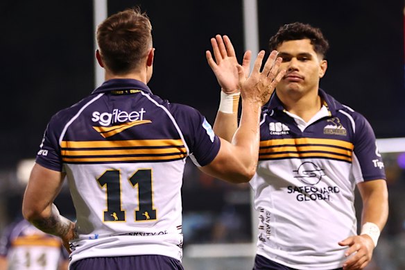Corey Toole of the Brumbies celebrates scoring a try in a dominating performance