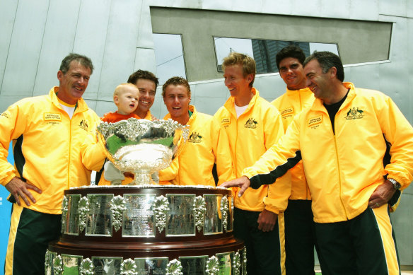 Australia’s most recent Davis Cup win in 2003. Wayne Arthurs is pictured third from right, with Lleyton Hewitt to his right and Mark Phillippoussis to his left.