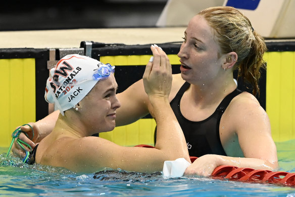 Shayna Jack of Australia reacts and hugs Mollie O’Callaghan after their race.