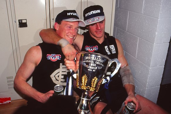 Andrew McKay and Peter Dean after winning the grand final. 