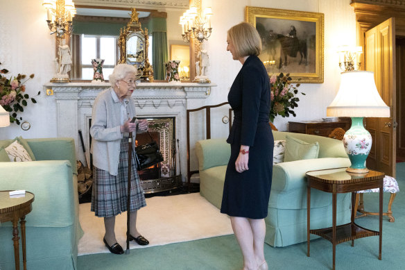 Queen Elizabeth greets newly elected leader of the Conservative party Liz Truss as she arrives at Balmoral Castle on Tuesday.