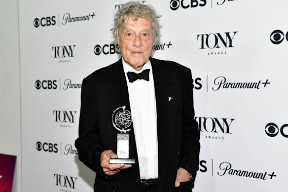 Tom Stoppard poses with the Tony award for best play for “Leopoldstadt” in 2023.