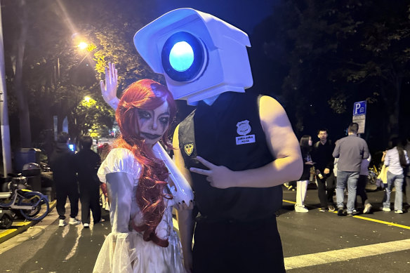 Expressing frustration: A Shanghai Halloween costume depicts a CCTV camera ubiquitous in China.