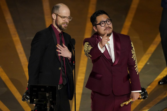 Daniel Scheinert (left) and Daniel Kwan accept the award for best director.