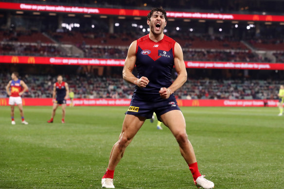 Christian Petracca roars his approval after booting a goal for the Demons.