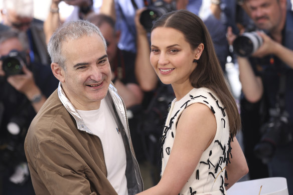 Director Olivier Assayas and Alicia Vikander at the Irma Vep premiere at the Cannes Film Festival.