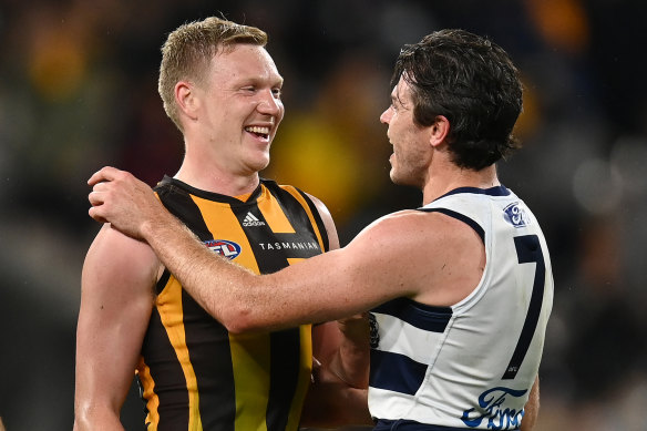 James Sicily and Isaac Smith shake hands after the Easter Monday blockbuster at the MCG.