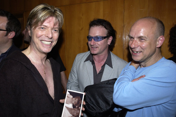 Brian Eno, far right, with David Bowie and Bono at the Meltdown Festival in London in June 2002.