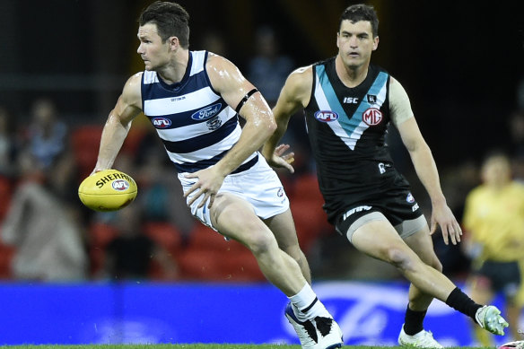 Patrick Dangerfield charges out of the centre in Geelong's big win.