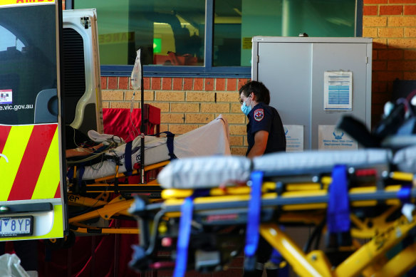 A patient arrives at the Northern Hospital in Melbourne, where the ambulance waiting bay is often busy or full.