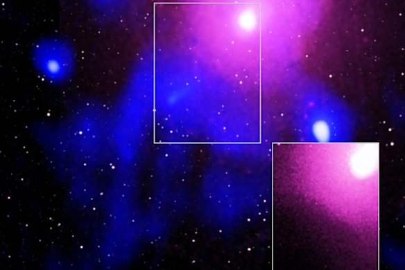 The Ophiuchus galaxy cluster viewed in a composite of X-ray, radio and infrared data. The bottom right image confirmed the record-breaking explosion created a crater so large it could hold 15 Milky Ways.