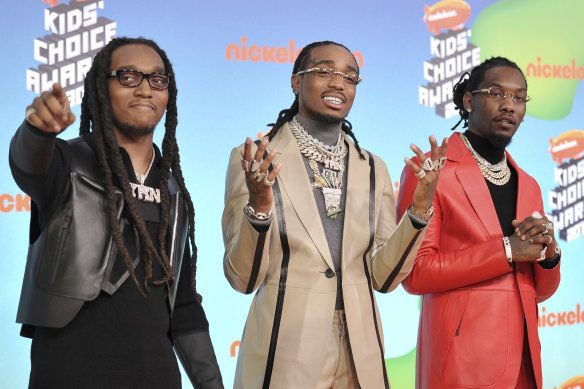 Takeoff, from left, Quavo and Offset, of Migos, appear at the Nickelodeon Kids’ Choice Awards in Los Angeles in 2019.