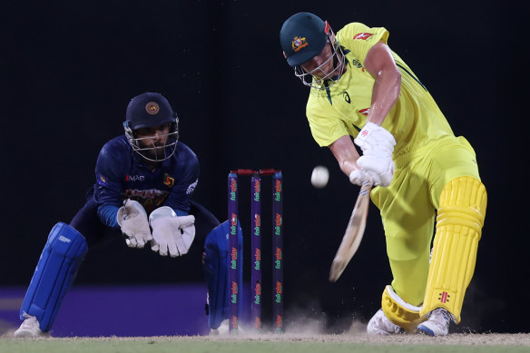 Cameron Green hits the boundary marking the winning runs during the 5th match in the ODI series.