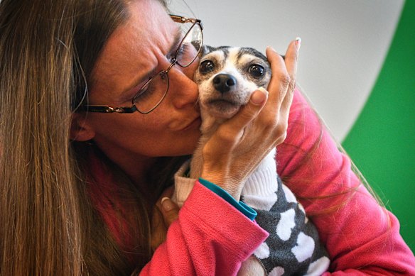 Katheryn Strang is reunited with her fox terrier, Dutchess.