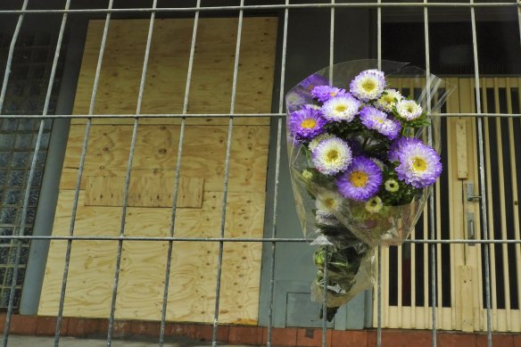 Flowers left outside the synagogue on Saturday.