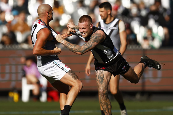 Jordan De Goey and Sam Powell-Pepper tussle.