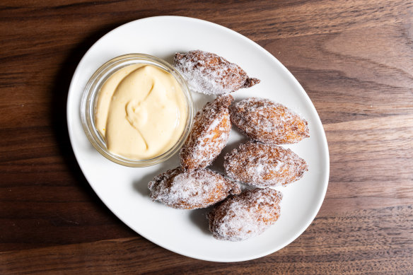 Fritelle di riso with preserved kumquat anglaise.