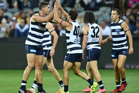 The Cats celebrate a goal.