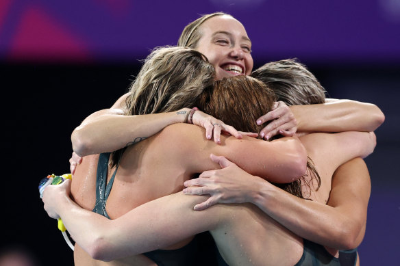 Australia’s record-breaking relay team celebrates gold.