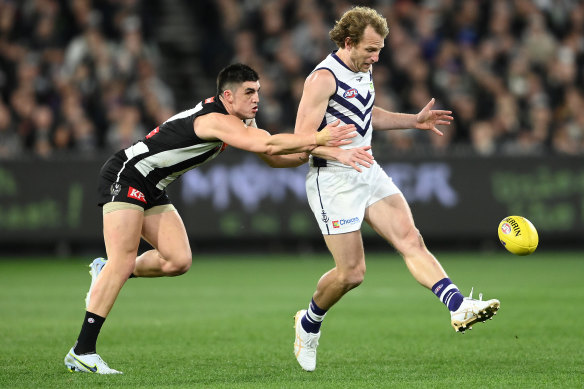 Brayden Maynard moves in to tackle Fremantle’s David Mundy last weekend.