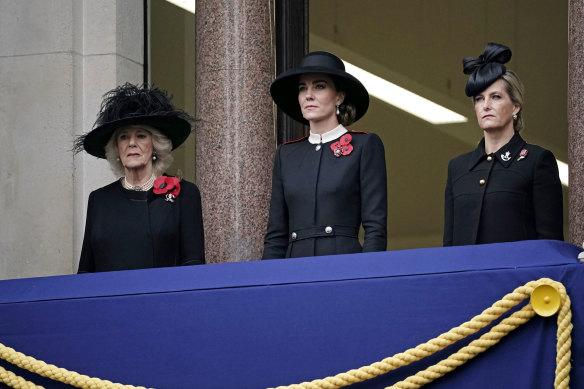 Camilla, Duchess of Cornwall, left, Kate, Duchess of Cambridge and Sophie, Countess of Wessex, right, stand on the balcony during the service.