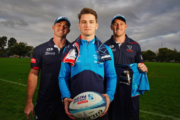 Williams F1 driver Logan Sargeant with Melbourne Rebels players Andrew Kellaway and Reece Hodge  at a media opportunity at Gosch’s Paddock in Melbourne.