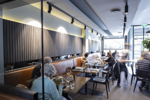 Bacash’s sleek, grey dining-room.