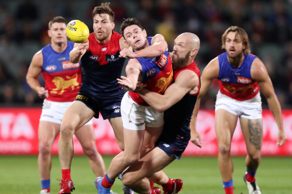 Lachie Neale is tackled by Max Gawn last weekend.