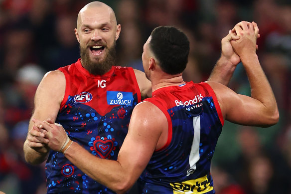 Steven May and Max Gawn celebrate a goal for the Demons.
