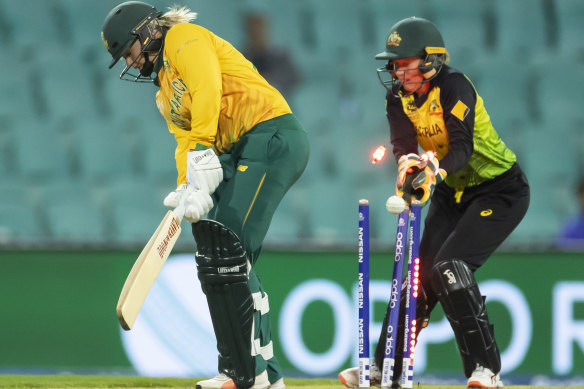 Australian wicketkeeper Alyssa Healy looks on as South Africa's Dane Van Niekerk is bowled. 