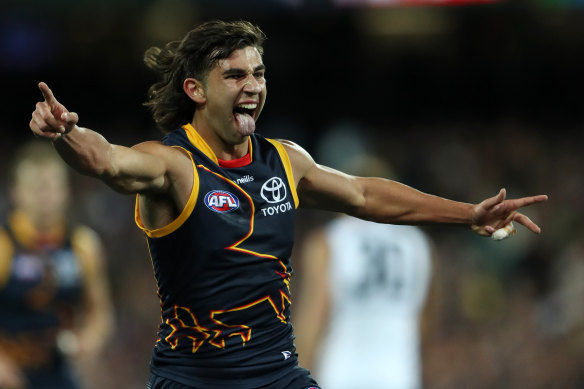 Josh Rachele of the Crows celebrates a goal.