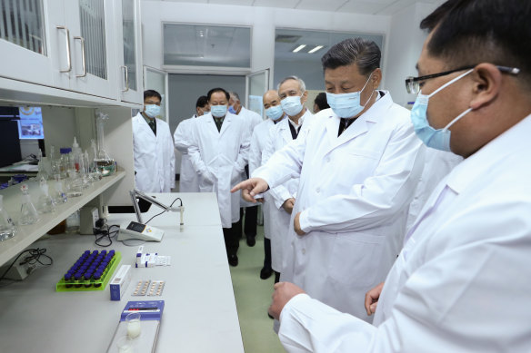 Chinese President Xi Jinping gets an update on vaccine development at the Academy of Military Medical Sciences in Beijing in the early stages of the pandemic.