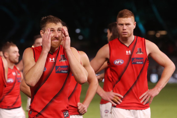 Essendon skipper Dyson Heppell (left) was involved in a heated exchange with midfielder Darcy Parish in the Bombers’ loss.