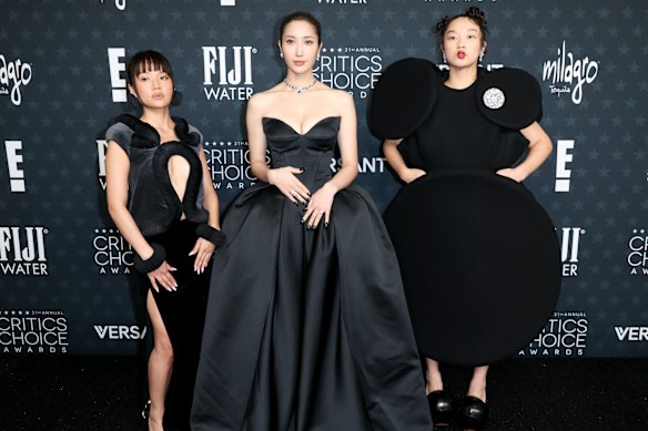 Ejae (centre) with her KPop Demon Hunters co-stars Rei Ami (left, who voices Zoey) and Audrey Nuna (Mira).