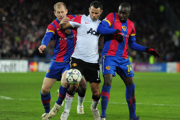 Scott Chipperfield (left) tackling Manchester United’s Ryan Giggs in his heyday at FC Basel.