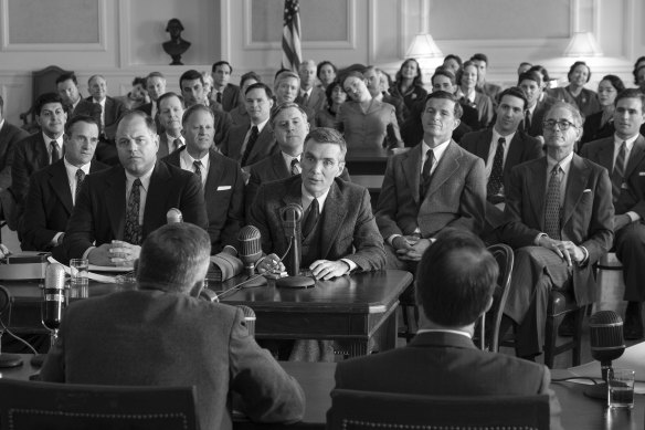 Cillian Murphy, centre, in a scene from Oppenheimer.